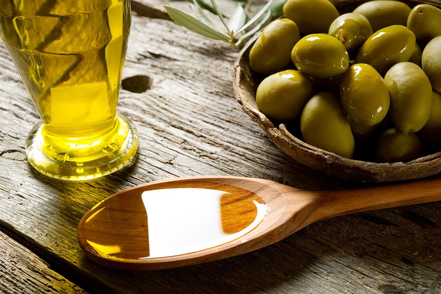 olive oil over spoon